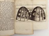 a book with a drawing of two houses inside of it