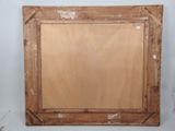 an old wooden picture frame with a picture on it