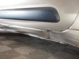 a close up of a car with a flat tire