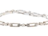 a close up of a bracelet on a white background