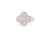 a close up of a diamond flower ring on a white background