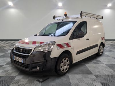 the white van is parked in a large room with a checkered floor
