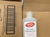 a bottle of liquid sitting on top of a box