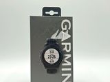 garmin gps watch in packaging on a white background