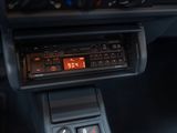 a car dashboard with a digital clock on it