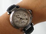a wrist with a watch on it that is on someone ' s arm