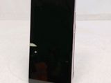 a cell phone that is sitting on top of a stand