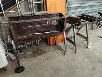 an image of a barbecue grill in a garage