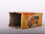a small box with a toy truck inside of it