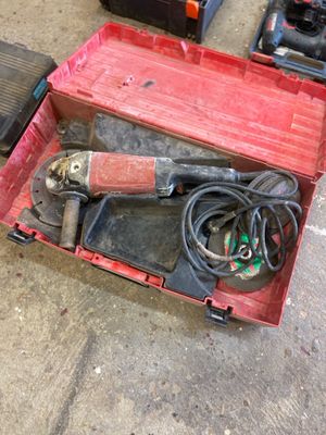 a red box with tools in it on the ground