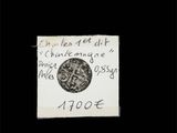 un morceau de papier sur lequel est représentée une pièce de monnaie