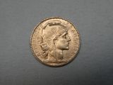 a close up of a coin with a woman ' s head on it