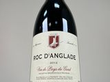 a bottle of wine that is sitting on a table