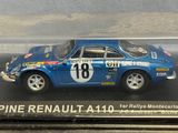 a blue toy car in a clear plastic case