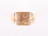 an image of a gold signet ring with the letter z on it
