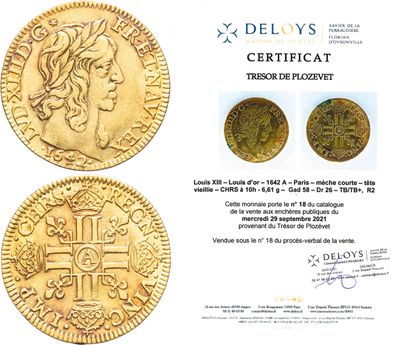 deux pièces d'or sur lesquelles figurent l'effigie d'une femme et une croix