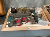 a tray with various items in it on a table