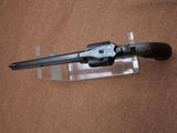 a gun that is laying on a table