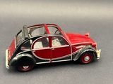 a small toy car that is sitting on a table