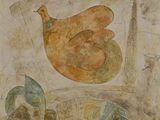 une peinture sur le mur d'un immeuble représentant un oiseau