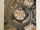 a picture of a picture of a spiral staircase in a building