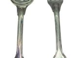 two spoons and a fork on a white background