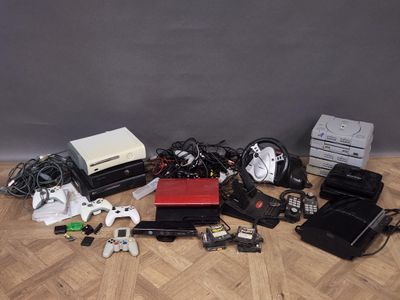 a lot of electronic devices that are sitting on the floor