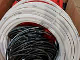 a box with a bunch of hoses inside of it