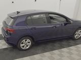 a picture of a blue car parked in a garage