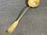 a spoon that is sitting on a table