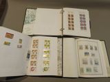 a lot of different stamps on the pages of a book