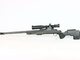 a rifle on a white background with a scope on it