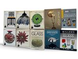 a lot of books that are sitting on a table