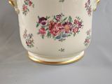 an image of a white bowl with pink flowers on it