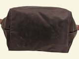 brown waxed canvas toiletry bag with brown leather handles