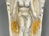 an image of a statue of a woman in a shell