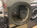 an image of a washer and dryer in a laundry room