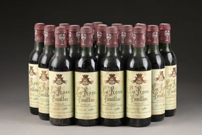 six bouteilles de vin sont alignées sur une table