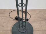 a lamp that is on top of a wooden floor