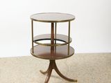 a close up of a table with a glass top on a carpet