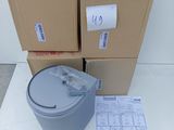 a box of boxes and a bucket on a table