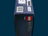 a black box with a red and white logo on it