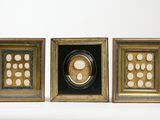 three framed picture frames with a picture of a woman in a circle