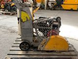 a machine that is sitting on a pallet in a warehouse