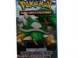 a close up of a box of pokemon trading cards on a white background