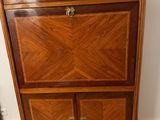 an image of a wooden cabinet with a marble top