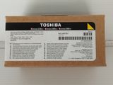 a box of toshiba ink cartridges sitting on top of a white surface
