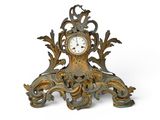 a clock that is sitting on top of a table