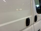 a white van that has a sticker on the side of it