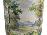 a vase with a painting of a landscape on it